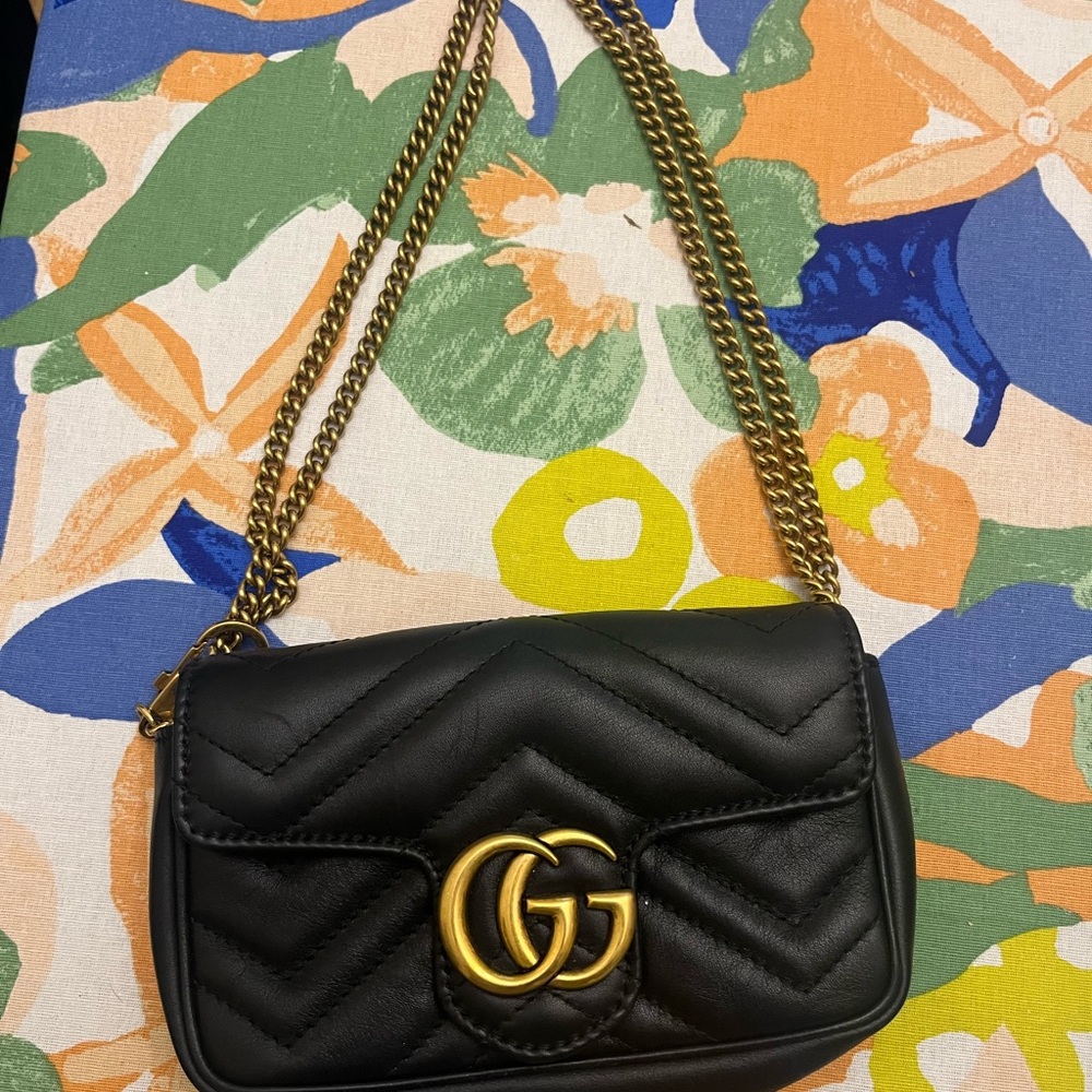 Authentic Gucci Quilted Crossbody Bag with Gold Accents